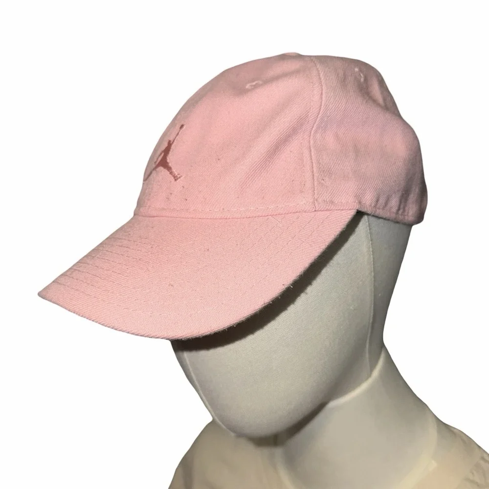 pink Nike‎ Air Jordan Kids Essentials adjustable baseball hat. Jumpman Logo